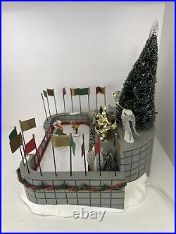 Department 56 Village Animated Rockefeller Plaza Skating Rink 56.52504 RETIRED