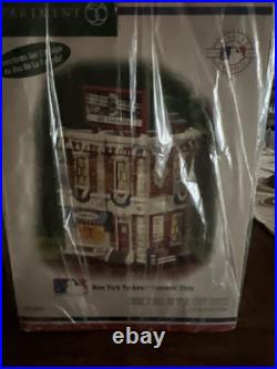 Dept 56 Christmas in the City New York Yankees Souvenir Shop #56.59224 Retired Dept 56 Christmas in the City New York Yankees Souvenir Shop #56.59224 Retired