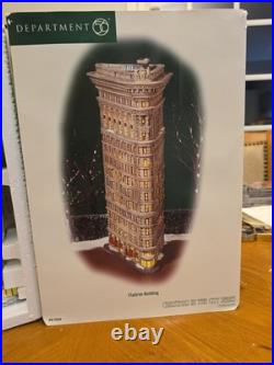 Dept 56 christmas in the city buildings