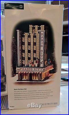 Retired-Mint- Department 56- Radio City Music Hall & 2 sets of Rockettes